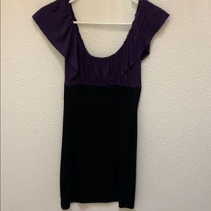 Chic form fitting purple and black dress